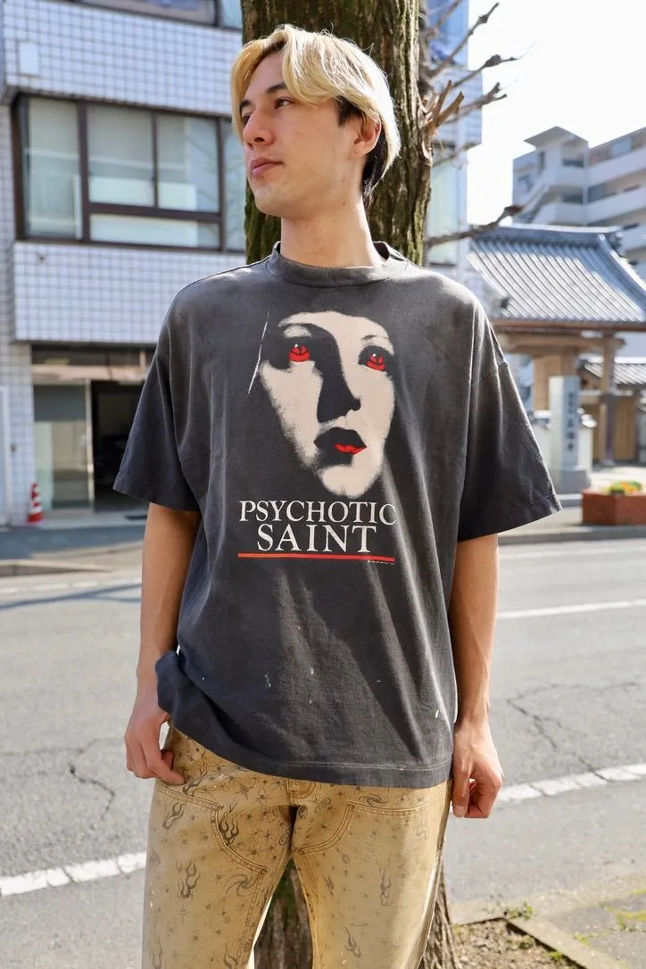 SAINT Mxxxxxx SS TEE/PSYCHOTIC SNT/BLK Gothic heavy metal rock style retro short-sleeved Mysterious woman's face printed distressed TEE Washed black S-XL Same as the original version Cylindrical side seam OE yarn fabric Garment dyeing Faded by heavy washing Bust plaster faded Correct version Matching of original accessories